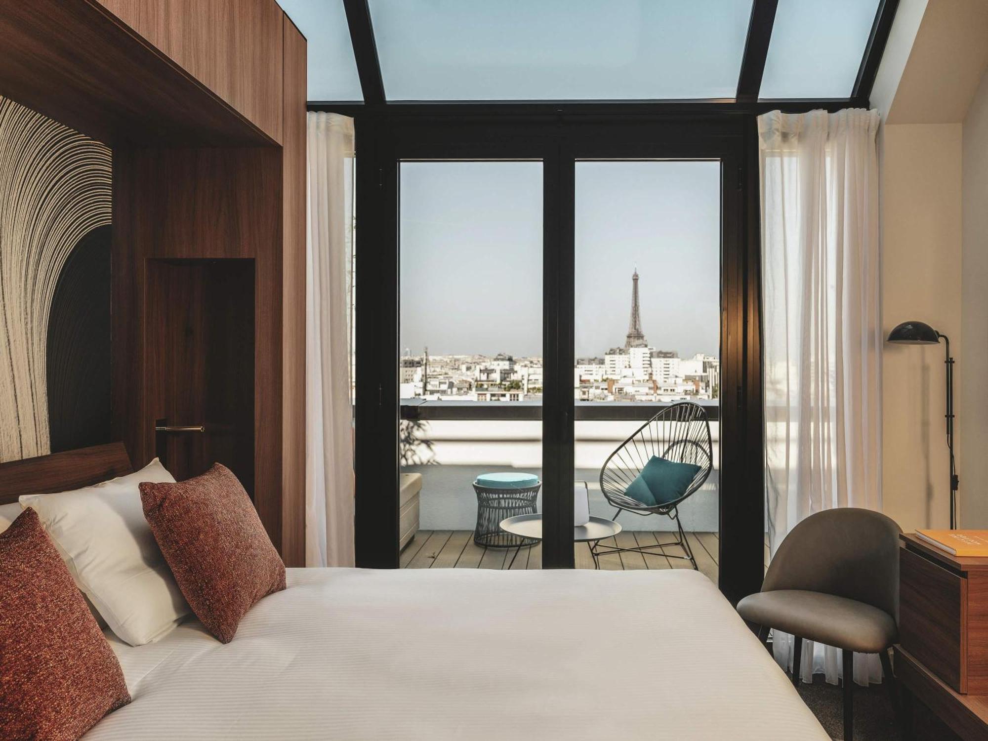 Executive Suite met Tweepersoonsbed en Tweepersoonsslaapbank - Uitzicht op de Eiffeltoren